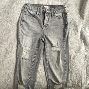 Kohl’s skinny jeans with rips , size 24 , high rise , brand new